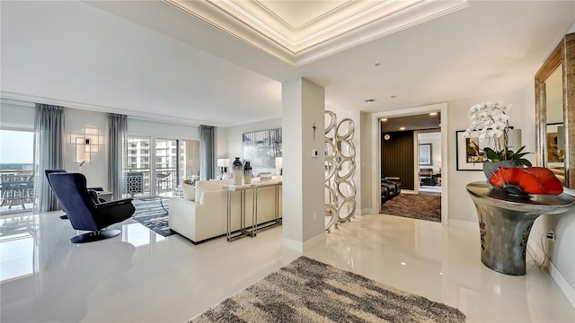 hall featuring light tile floors and crown molding