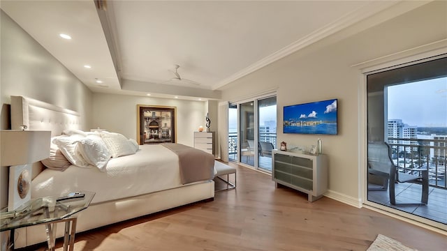 bedroom featuring hardwood / wood-style floors and access to outside