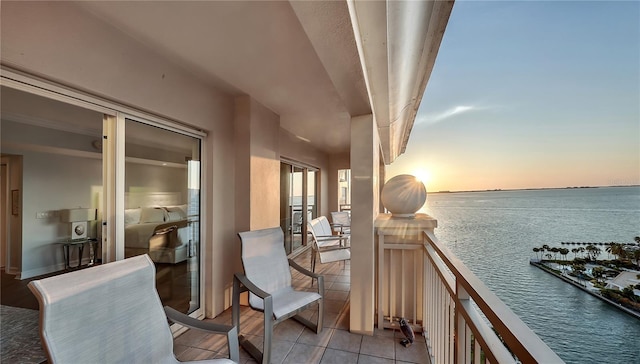 balcony at dusk with a water view