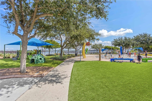 view of community featuring a yard and a playground