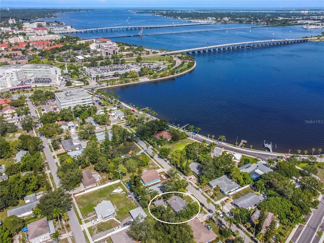 drone / aerial view with a water view