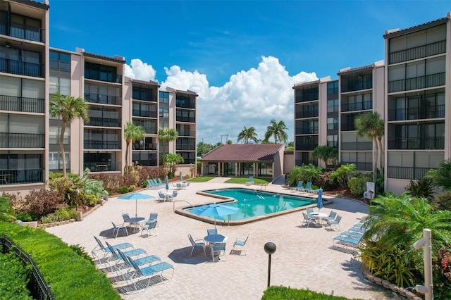 view of swimming pool with a patio area