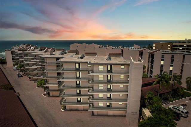 outdoor building at dusk with a water view