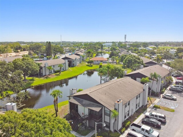 aerial view with a water view and a residential view