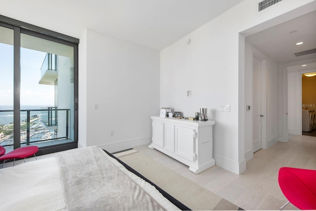 bedroom featuring light hardwood / wood-style floors