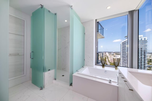 bathroom featuring vanity, tile flooring, and plus walk in shower