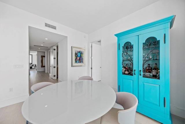 dining area featuring light hardwood / wood-style floors