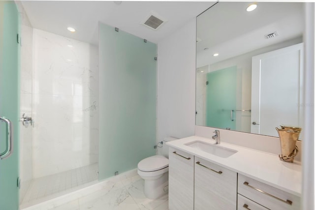 bathroom featuring vanity, tile floors, toilet, and walk in shower