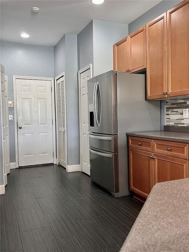 kitchen with stainless steel fridge with ice dispenser