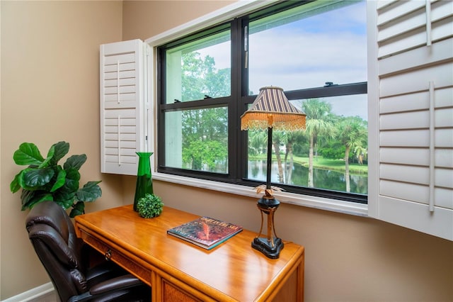 home office featuring a water view