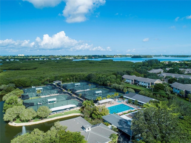 birds eye view of property featuring a water view