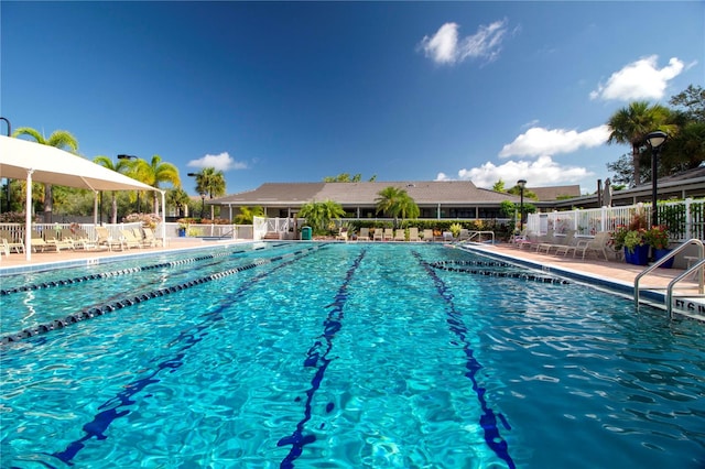 community pool with fence