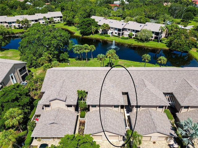 aerial view featuring a water view and a residential view