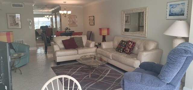 living room featuring an inviting chandelier, tile flooring, and crown molding