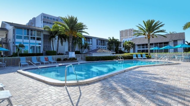 view of swimming pool featuring a patio