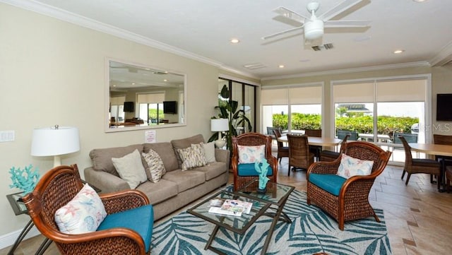 living room featuring ornamental molding, ceiling fan, and tile floors