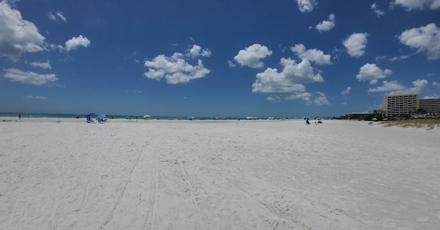 property view of water featuring a beach view