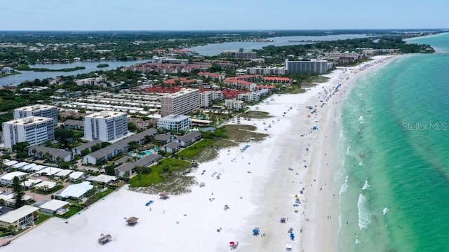 aerial view with a beach view and a water view