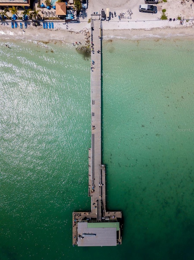 birds eye view of property featuring a water view and a view of the beach