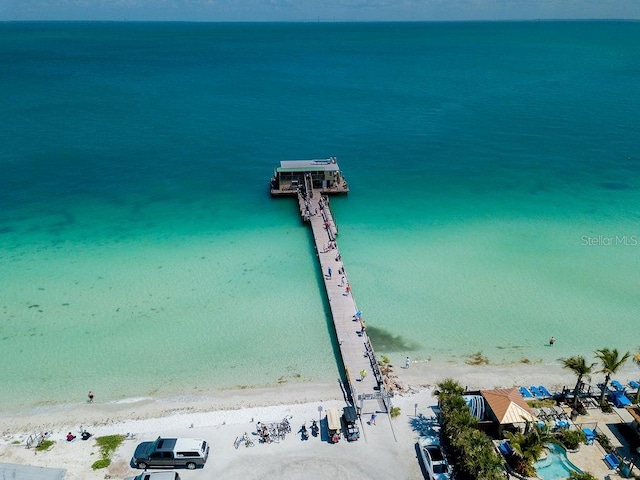 bird's eye view with a beach view and a water view