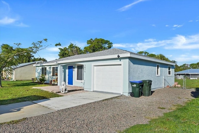 exterior space featuring a front yard and a garage