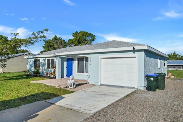 ranch-style house with a front yard and a garage