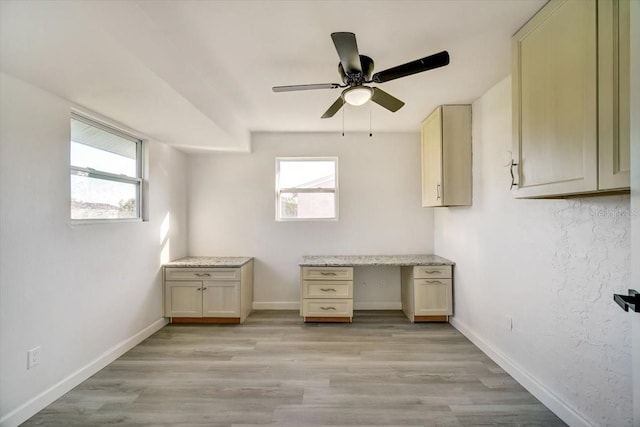 interior space with ceiling fan and light wood-type flooring