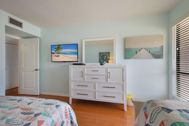 bedroom featuring light hardwood / wood-style floors