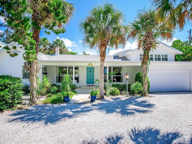 single story home featuring a porch