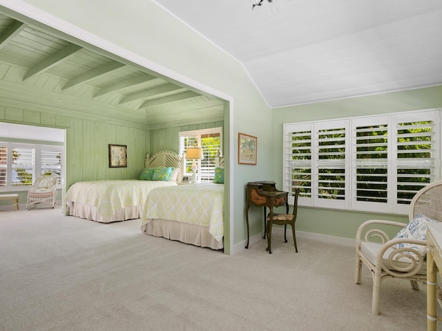 bedroom with wood ceiling, multiple windows, light colored carpet, and lofted ceiling with beams