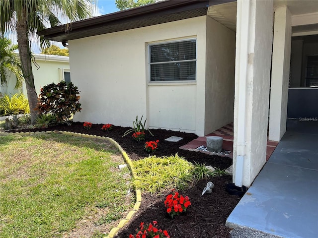 view of property exterior featuring a yard