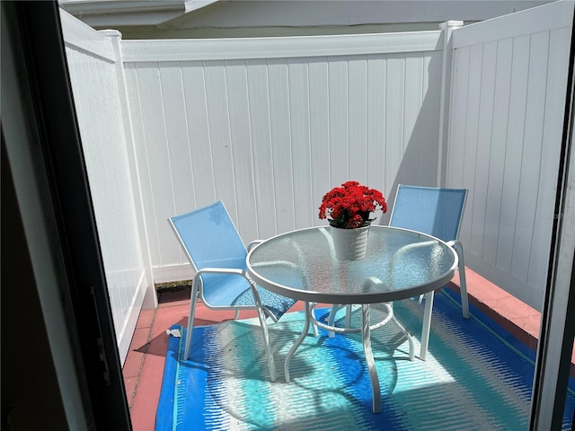 balcony with a patio area