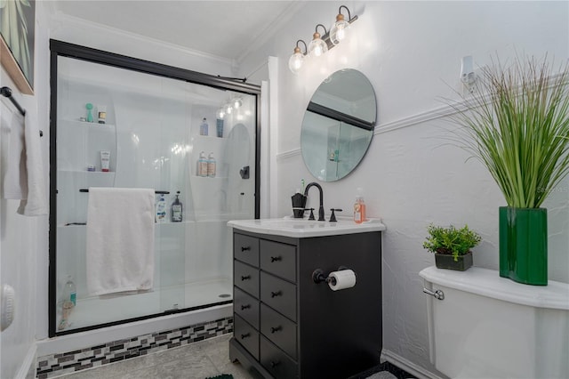 bathroom featuring crown molding, toilet, an enclosed shower, and vanity