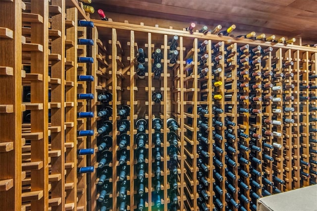 wine cellar featuring wooden ceiling