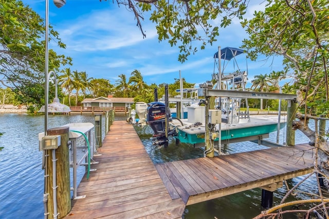 dock area featuring a water view