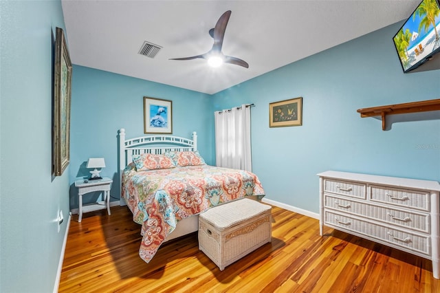 bedroom featuring ceiling fan and wood-type flooring