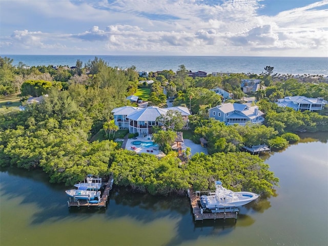 drone / aerial view with a water view