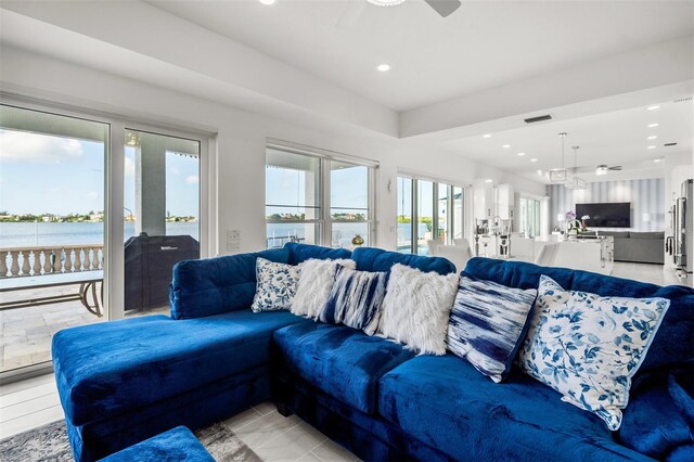 living room featuring ceiling fan