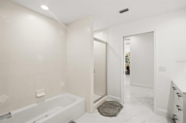 bathroom with vanity, tile floors, and independent shower and bath