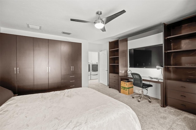 carpeted bedroom featuring a closet and ceiling fan