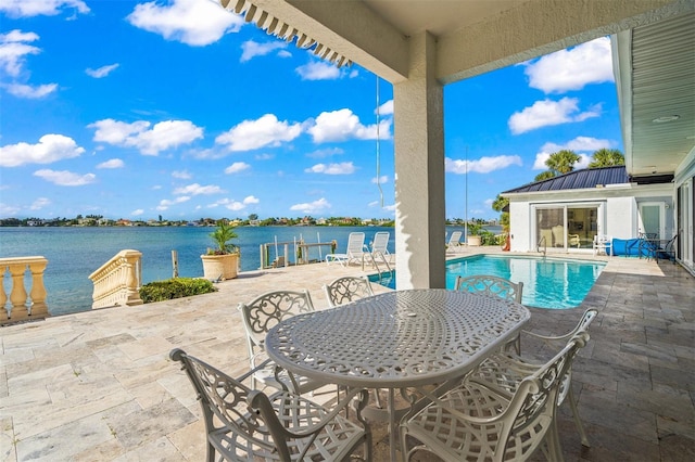 view of patio featuring a water view