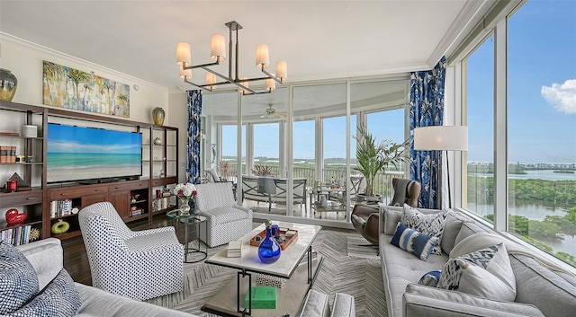 401 N Point Rd Unit 901, Osprey, FL 34229 - living area featuring ornamental molding, wood finished floors, a chandelier, a water view, and a ceiling fan