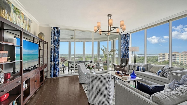 401 N Point Rd Unit 901, Osprey, FL 34229 - living area with a wall of windows, dark wood-style flooring, a chandelier, healthy amount of natural light, and a ceiling fan