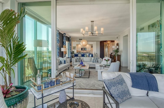 401 N Point Rd Unit 901, Osprey, FL 34229 - living room with ornamental molding, a chandelier, and light tile patterned flooring