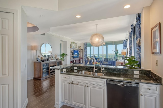 kitchen featuring black dishwasher, sink, dark hardwood / wood-style flooring, white cabinetry, and dark stone counters