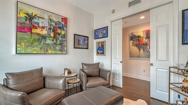 401 N Point Rd Unit 901, Osprey, FL 34229 - sitting room featuring dark wood-type flooring, baseboards, and recessed lighting