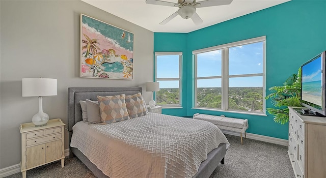 carpeted bedroom featuring ceiling fan