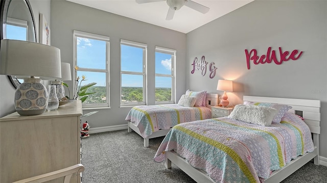 bedroom with ceiling fan and carpet floors