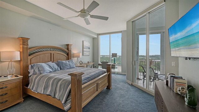 401 N Point Rd Unit 901, Osprey, FL 34229 - bedroom with access to outside, dark carpet, expansive windows, and ceiling fan