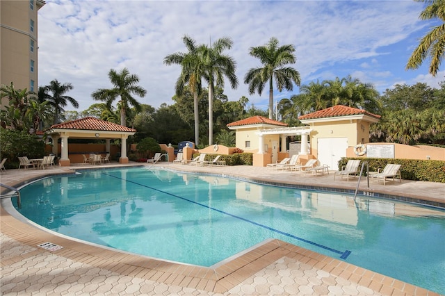 view of swimming pool with a gazebo and a patio